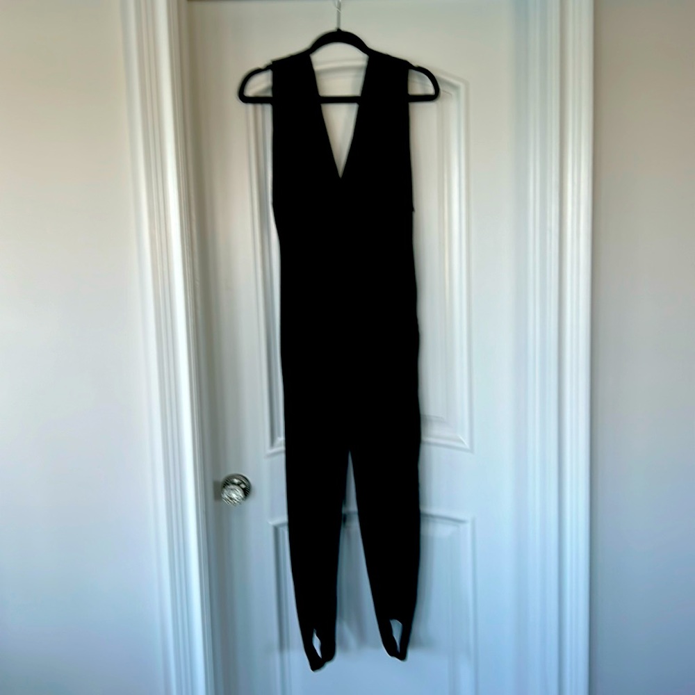 1990’s Catsuit with stirrup legs.  Fabulous one piece
